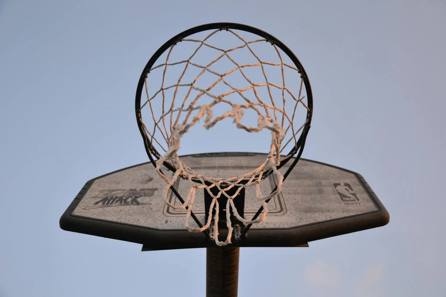 low angle photography of brown and black basketball hoop